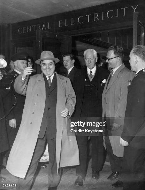 Soviet politician and Minister for Power Stations Georgi Maksimilianovich Malenkov outside the Central Electricity Authority HQ in Oxford Street,...