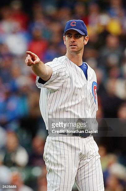 Mark Prior of the Chicago Cubs points against the Pittsburgh Pirates during the first game of a double-header on September 27, 2003 at Wrigley Field...