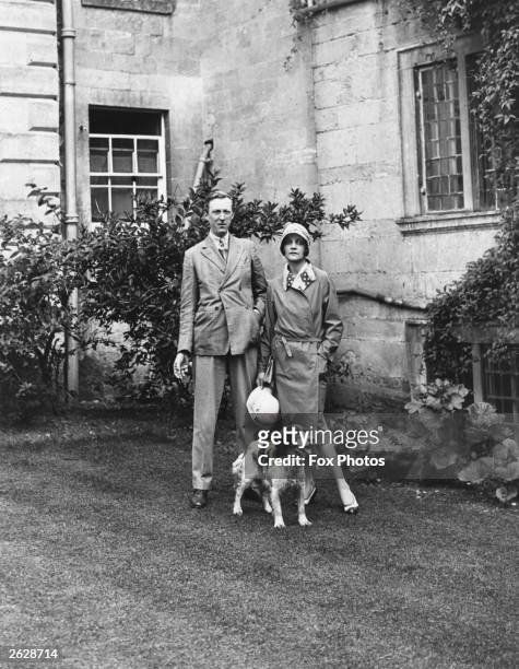 English poet and art critic Sacheverell Sitwell with his wife and pet dog at Weston Hall, Towcester. Original Publication: People Disc - HM0319