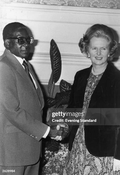 African nationalist and Zimbabe's first prime minister Robert Gabriel Mugabe meeting British prime minister Margaret Thatcher at No 10 Downing...
