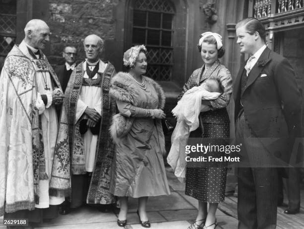Earl Edward Spencer , and his first wife with Queen Elizabeth the Queen Mother at Westminster Abbey after the christening of their daughter, Sarah....