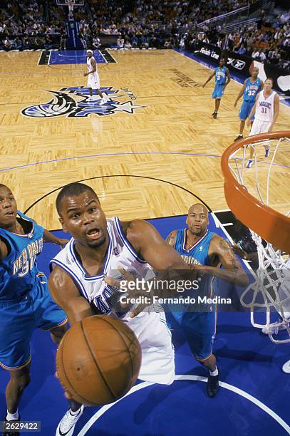Alton Ford of the Orlando Magic takes the ball up during the NBA preseason game against the New Orleans Hornets at TD Waterhouse Centre on October...