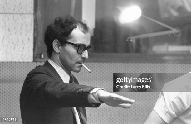 French film director Jean-Luc Godard during the filming of 'Sympathy For the Devil' , featuring the Rolling Stones. Original Publication: People Disc...