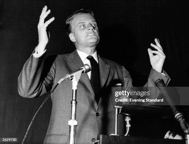 American Christian evangelist Billy Graham preaching at one of his rallies. Original Publication: People Disc - HF0376