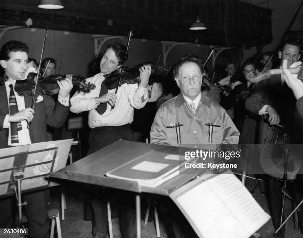 Pierre Montreux, the principal conductor of the London Symphony Orchestra, rehearsing at the Memorial Hall, Farringdon Street. It is his 88th...