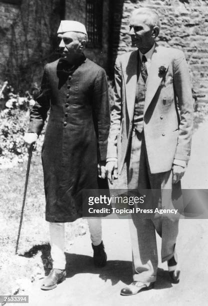 Indian Muslim politician Muhammad Ali Jinnah , right, leaves his residence with Indian Prime Minister Jawaharlal Pandit Nehru , after a 90-minute...