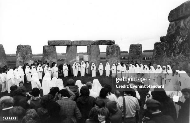 Druids, a religious sect, practise their art at the ruins in Stonehenge during the mid-summer solstice.