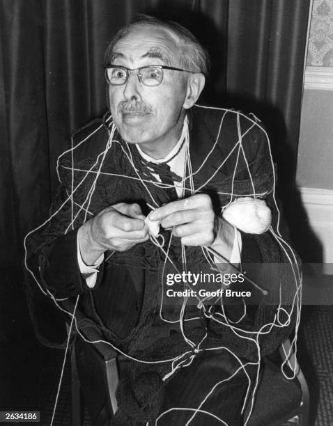 Eccentric scientist and television presenter Dr Magnus Pyke, famed for his wild gesticulations, experiments with a ball of wool and knitting needles...