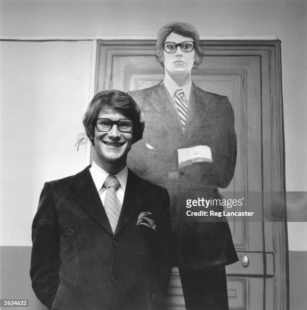 French fashion designer Yves St. Laurent, originally Henri Donat Mathieu in his Paris boutique with a replica dummy of himself.