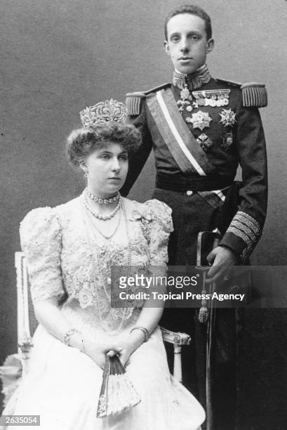 Alfonso XIII , King of Spain and Victoria Eugenie, Queen of Spain , whom he married in 1906. She is a grand-daughter of Queen Victoria.