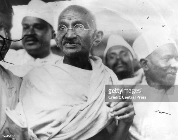 Mahatma Gandhi , Indian nationalist and spiritual leader, leading the Salt March in protest against the government monopoly on salt production.