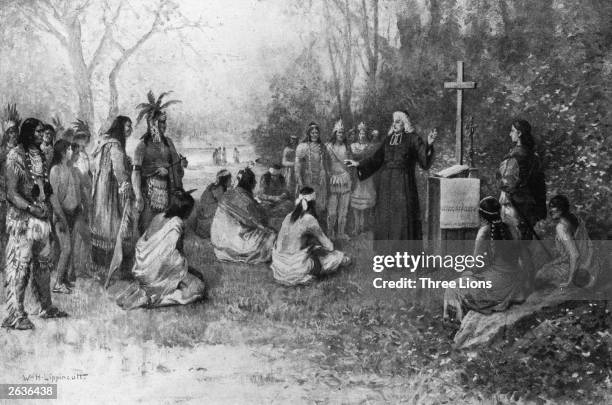 'Marquette preaching to the Indians' by William Lippincott, depicting Jesuit missionary Jacques Marquette also known as Pere Marquette, preaching to...