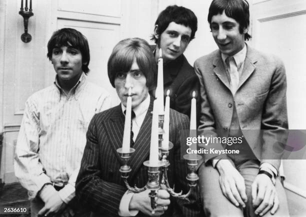 English rock group The Who, during their 1966 German/Swiss tour, from left to right; drummer Keith Moon , Roger Daltrey , John Entwistle and Pete...