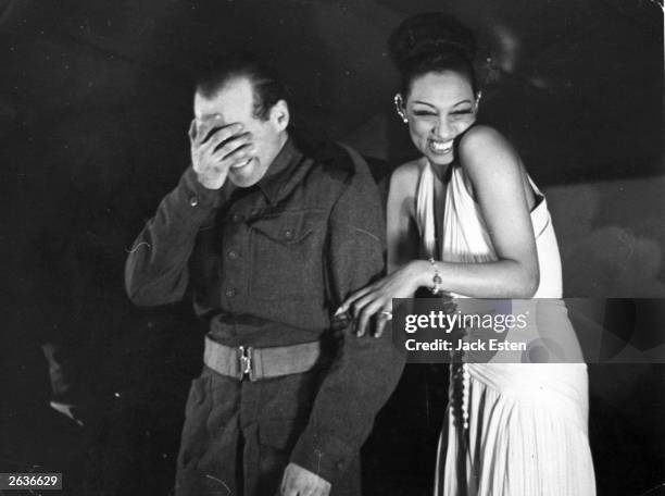 Josephine Baker , the American singer and dancer, entertains the troops at a London victory party. Original Publication: Picture Post - 1993 -...