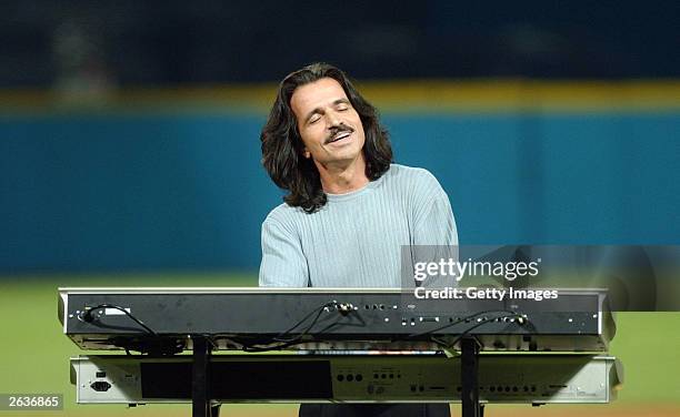 Recording artist Yanni performs the National Anthem prior to game five of the Major League Baseball World Series between the New York Yankees and the...