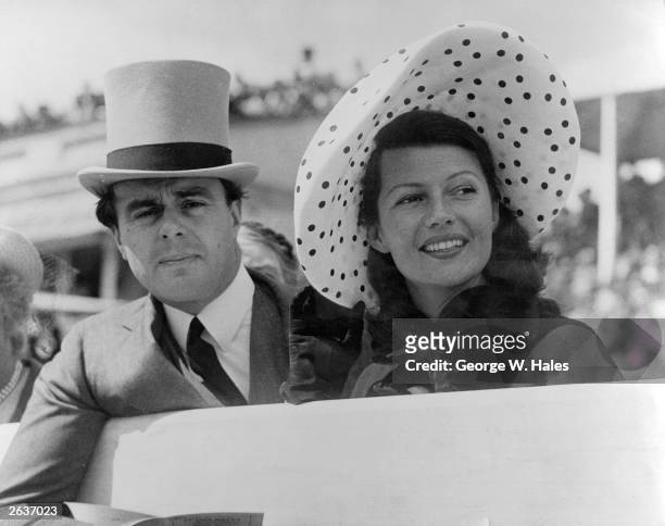 Prince Aly Khan at Epsom races with his wife, Hollywood actress Rita Hayworth . Original Publication: People Disc - HF0469