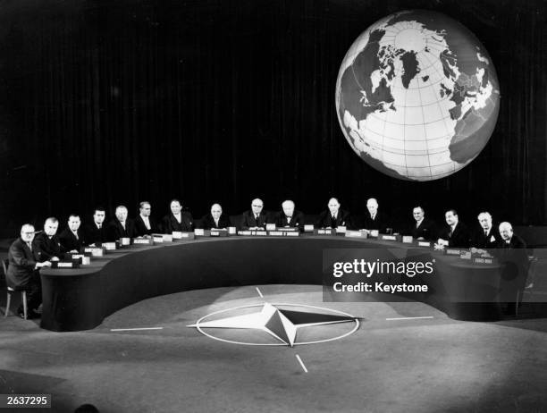 Delegates at the NATO conference at Paris. From left, Van Acker , Dieffenbaker , Gaillard , Adenauer , Hansen , Karamanlis , Jonasson , Zoli , Spaak...