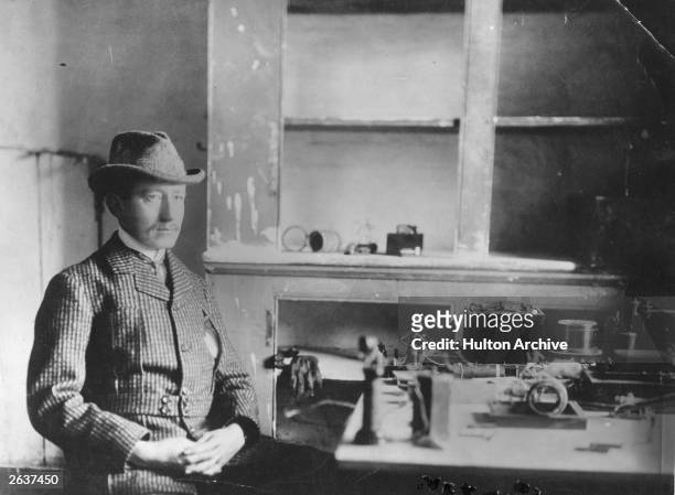 Italian physicist and inventor Guglielmo Marconi with his wireless apparatus in the hospital at Signal Hill, Newfoundland, December 1901 with which...