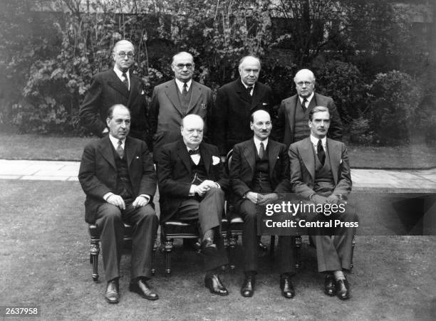 British Prime Minister Sir Winston Churchill , with the War Cabinet in 1941; from left to right seated, Sir John Anderson , Churchill, Clement Attlee...
