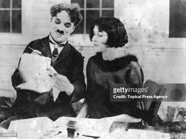 Charlie Chaplin , English film actor and director signs up his second wife Lita Grey as an actress at his studio.