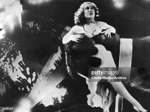 American actress Fay Wray in the clutches of King Kong, in a scene from the Hollywood horror movie,' King Kong', directed by Merian C Cooper and...
