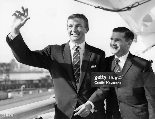 Richie Benaud and Neil Harvey, captain and vice captain respectively, of the 1961 Australian Test Team, on board the SS Himalaya as it sails into...
