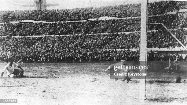 Another goal is scored for Uruguay during the final of the first World Cup competition between Argentina and Uruguay at Montevideo.