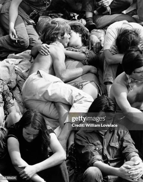 Couple kissing in the crowd at the Isle of Wight Pop Festival.