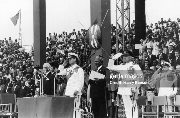 Philip, Duke of Edinburgh standing next to Jomo Kenyatta Kenyan Politician at the Independence Day Celebrations.