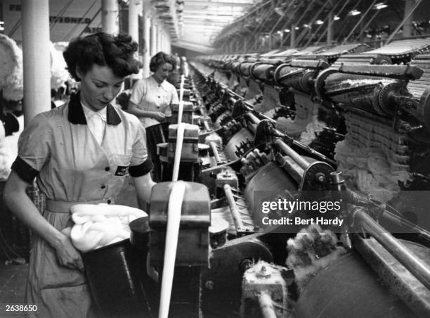 Workers at the Lilac Mill cotton factory, Lancashire. Original Publication: Picture Post - 7474 - Cotton's Amazing Recovery - pub. 1955