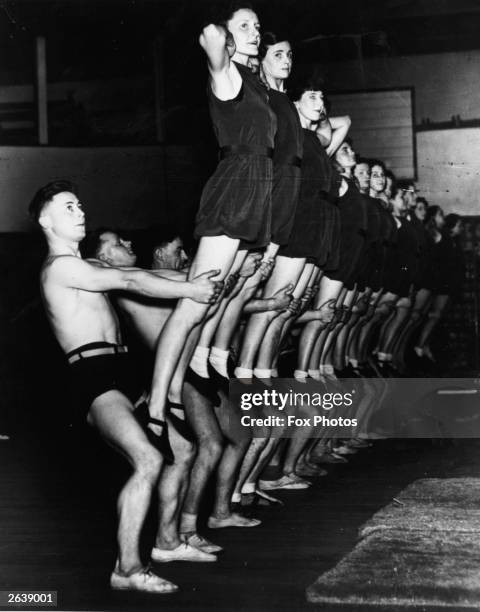 Members of the Manchester YMCA practising for a fitness display at the Free Trade Hall.