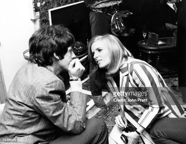 Photographer Linda Eastman talks to Beatle Paul McCartney at the press launch of the Beatles new album 'Sergeant Pepper's Lonely Hearts Club Band'....