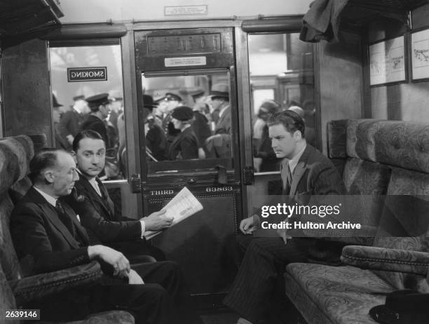 British actor Robert Donat in 'The 39 Steps', directed by Alfred Hitchcock and produced by Gaumont International.