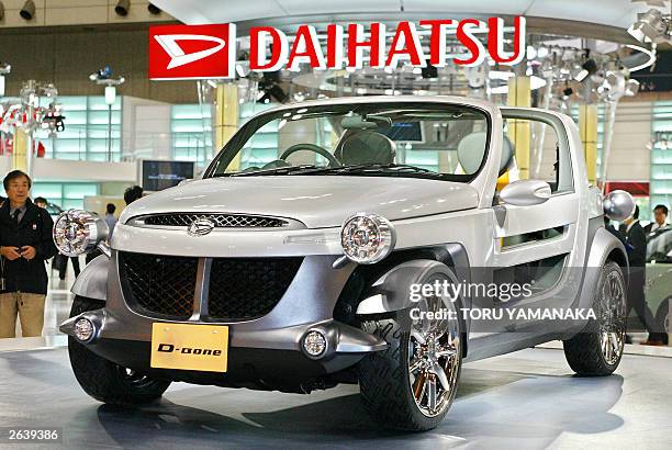 Japan's auto maker Daihatsu unviels the consept model of 4WD sports-type vehicle "D-Bone" during the preview of the 37th Tokyo Motor Show in...