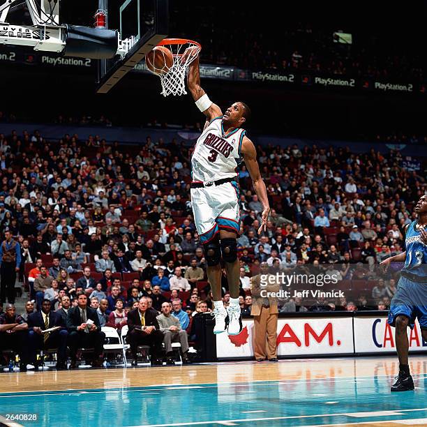 Shareef Abdur-Rahim of the Vancouver Grizzlies dunks against the Minnesota Timberwolves circa 2001 at General Motors Place in Vancouver, Canada. NOTE...
