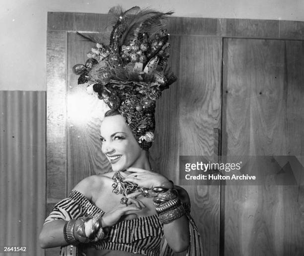 Singer and actress Carmen Miranda , poses in her dressing room. Original Publication: People Disc - HN0244