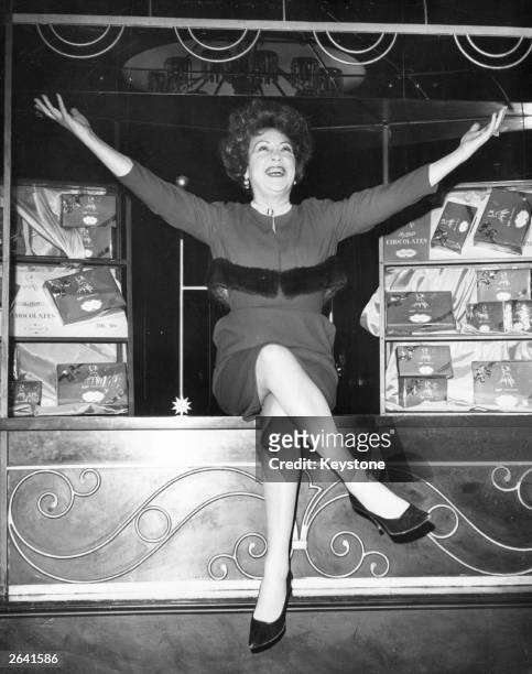 Ethel Merman, the American star in a series of Broadway musicals celebrates being booked by Bernard Delfont to perform at 'The Talk Of The Town'.