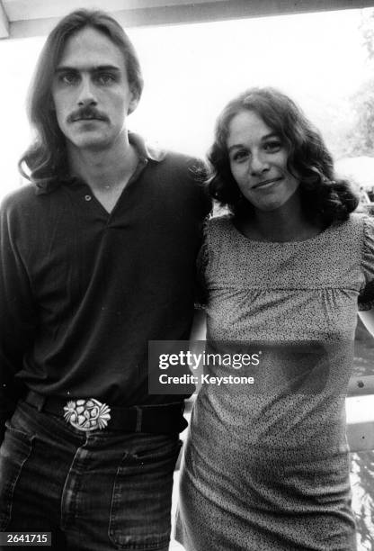 American singer-songwriters James Taylor and Carole King.
