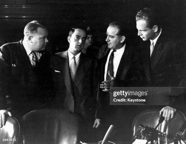 American politician Joseph Raymond McCarthy with David Shine, Roy Cohn and Frank Carr. McCarthy led a campaign against supposed Communist subversion...