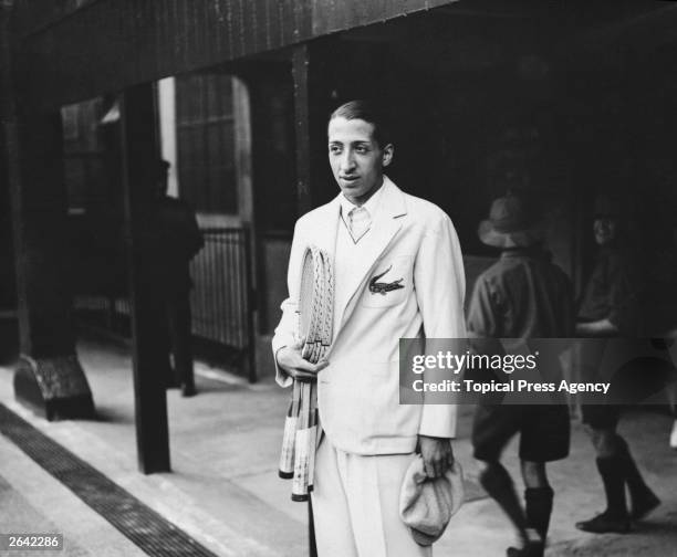 French Tennis player Rene Lacoste at All England Club, Wimbledon, London, 20th June 1927. He is wearing his embroidered crocodile motif. Original...