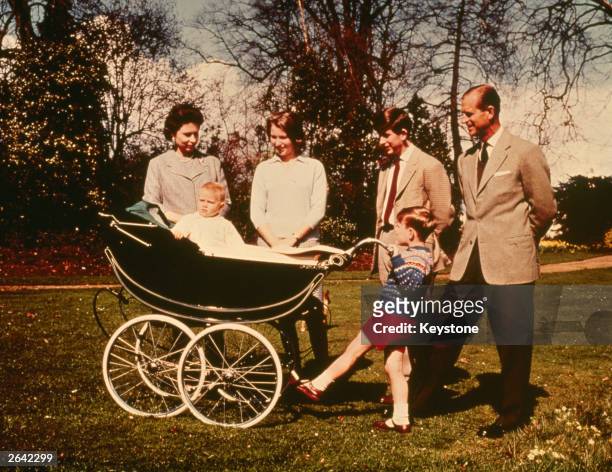 Queen Elizabeth II and The Prince Philip, Duke of Edinburgh with their children ; Charles Prince of Wales, Prince Andrew, Prince Edward and Princess...