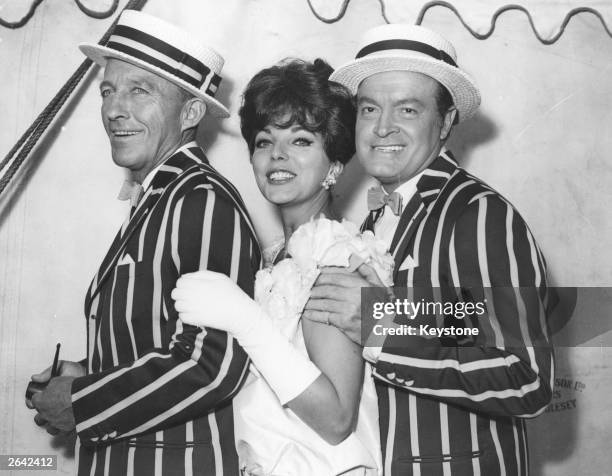 English actress Joan Collins with Bob Hope and Bing Crosby, working together in Shepperton on the Melvin Frank movie 'Road To Hong Kong'.