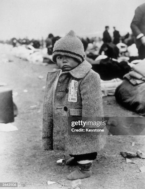 This Japanese baby is one of over 4 million Japanese repatriated from far eastern ports by the Americans.