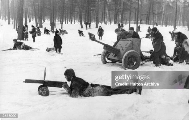 Russian schoolchildren are taught the arts of war with realistic militay exercises given by Red Army instuctors using wooden replica machine guns and...