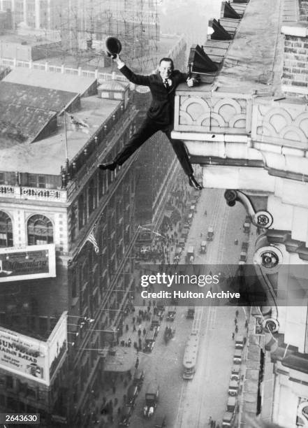 Harry Gardiner of Washington DC hanging from the 24th story of the Hotel McAlpin, Broadway, New York.