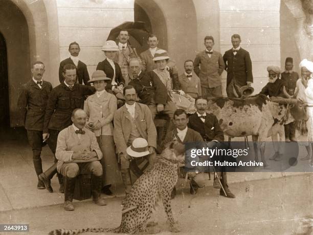 Group of colonials photographed with a pet cheetah at Secunderabad, near Hyderabad, during the days of the British Raj.