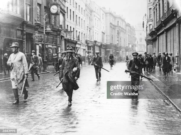 Armed anti-Treaty members of the Irish Republican Army in Grafton Street, Dublin during the Irish Civil War.