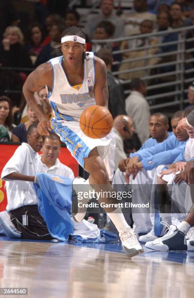 Carmelo Anthony of the Denver Nuggets drives against the Indiana Pacers on October 24, 2003 at the Pepsi Center in Denver, Colorado. NOTE TO USER:...