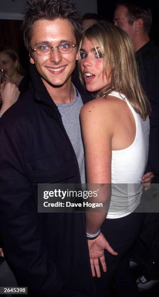 British singer Billie Piper and boyfriend Richie Neville from the boy band "5ive" attend the new "Rock Night Club" on February 16, 2000 in London.