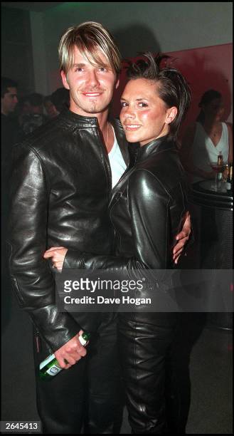 British footballer David Beckham and wife Victoria Beckham attend the Versace Store opening party on New Bond Street on June 11, 1999 in London.